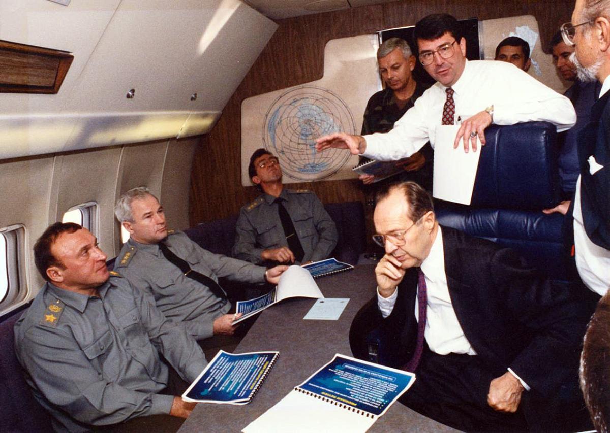  Grachev and Perry on the airplane to Kansas with Ash Carter briefing them.